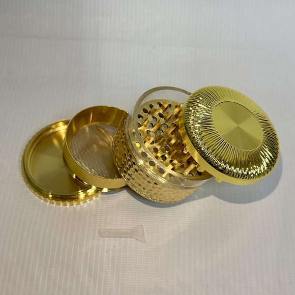 Moledor metálico dorado